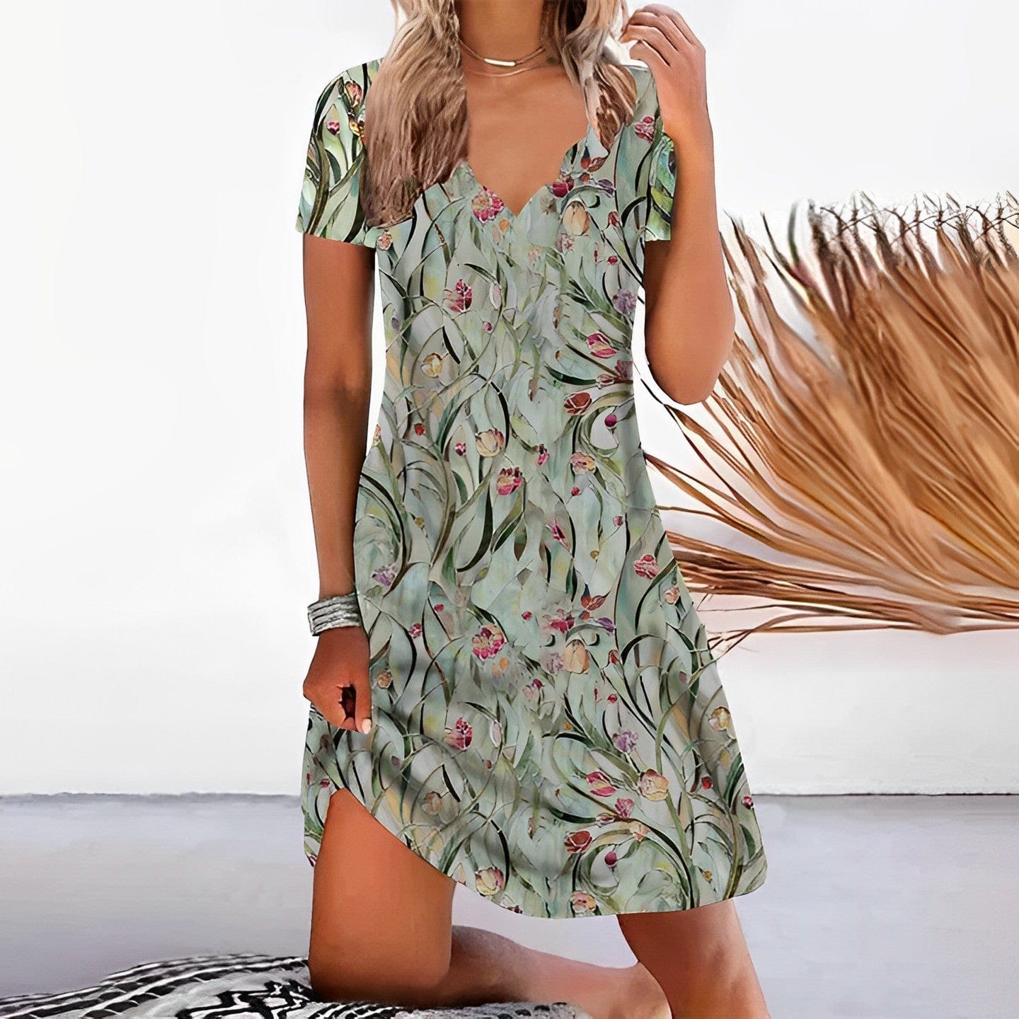 LP | Abito verde con motivo floreale